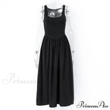 Vestido midi trapecio sin mangas con cuello redondo, corte en A, ideal para verano, fiestas casuales en la playa o discotecas.