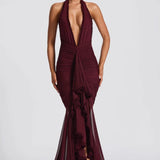 Vestido de noche sexy de sirena con escote pronunciado y espalda abierta.