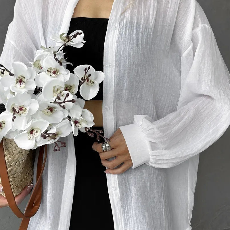 Blusa casual chic lisa de manga larga