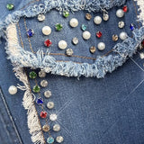 Abrigo largo en denim en contraste con perlas