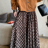 Falda midi fluida de cintura alta con estampado de cuadros vintage en tonos naturales