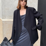 Blazer negro informal de gran tamaño