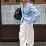 Blazer azul casual con mangas largas
