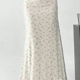 Falda midi trapecio de satén floral