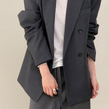 Blazer con cinturón estilo viajero