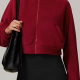 Chaqueta de yoga cálida y resistente al viento con cuello alto y cierre de cremallera, forrada de polar, con forro y cuello alto.