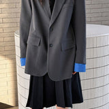 Blazer con bloques de color elegante e informal