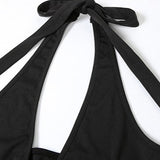 Vestido de noche sin espalda con tirantes y pajarita