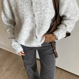 Chaleco vintage de punto gris claro con botones de concha