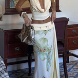 Conjunto de falda larga estampada sexy con espalda ajustada y espalda abierta.