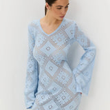 Vestido largo de punto jacquard con estampado de rombos y mangas largas
