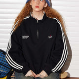 Sudadera retro con media cremallera y cuello alto