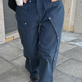 Pantalones cargo de pierna ancha con cintura baja y abertura con tachuelas