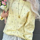Blusa holgada con escote tipo jersey de punto floral