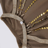 Vestido mini ajustado con espalda abierta, mangas murciélago y cadena.