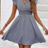 Vestido de mujer - Escote cruzado - Mangas con volantes - Cintura ajustada - Falda acampanada