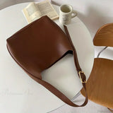 Bolso de hombro minimalista de piel sintética, fácil de combinar.
