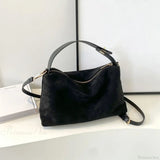 Bolso de mano otoño-invierno en ante mate y piel de vacuno