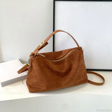 Bolso de mano otoño-invierno en ante mate y piel de vacuno