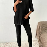 Conjunto de dos piezas acanalado para mujer: top holgado de manga corta y leggings de cintura alta.