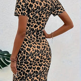 Vestido de mujer - Entallado - Mangas cortas - Escote en forma de lágrima - Detalles de malla - Largo hasta la rodilla