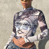 Blusa sexy de manga larga con cuello redondo en malla transparente estampada.