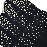 Vestido de noche sin tirantes con cuentas