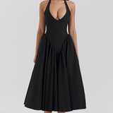 Vestido de noche sin espalda con tirantes y pajarita