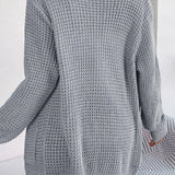 Chaleco de punto suelto con bolsillos