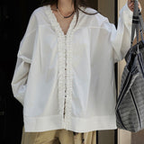 Blusa patchwork de manga larga con volantes