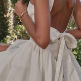 Vestido de noche sexy sin espalda con pajarita