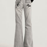 Vaqueros bootcut ajustados y versátiles en gris humo