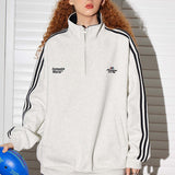 Sudadera retro con media cremallera y cuello alto