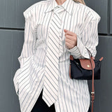 Blusa elegante de rayas con hombreras, estilo lazo y blusa elegante.