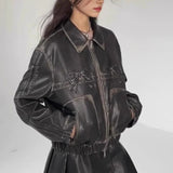 Chaqueta de motociclista de piel sintética con lazo decorativo