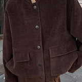 Chaqueta con cuello alto y botones de un solo pecho