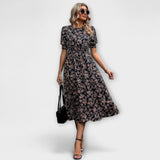 Amelia - Vestido con escote redondo y patrón floral
