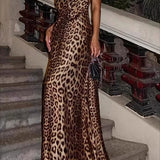 Vestido largo con estampado de leopardo, espalda descubierta, escote pronunciado y lazo.