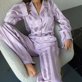 Conjunto de dos piezas: pantalón de oficina con dobladillo y estampado rosa