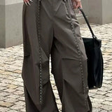 Pantalones cargo retro Y2K con botones y dobladillos