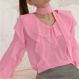 Elegante blusa de gasa lisa con volantes y lazo.