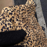 Falda midi acampanada con estampado de leopardo vintage
