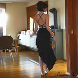 Elegante vestido midi de verano sin mangas con volantes y espalda abierta, adornado con un lazo.