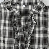 Blusa de cuadros británicos, escote en pico con volantes y mangas abullonadas