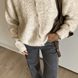 Chaleco vintage de punto gris claro con botones de concha