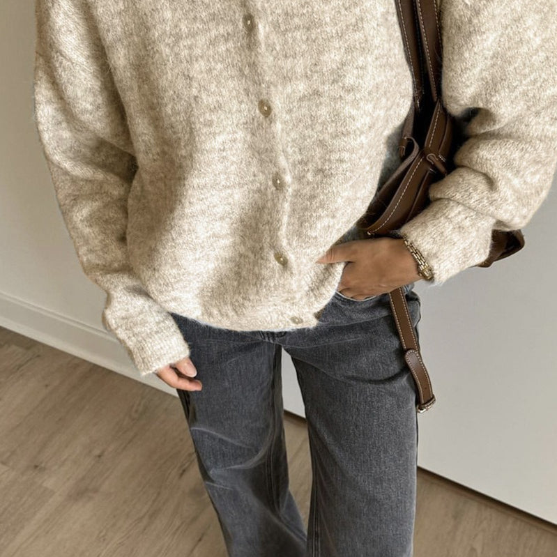 Chaleco vintage de punto gris claro con botones de concha