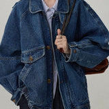 Chaqueta utilitaria en denim lavado con cuello alto