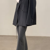 Blazer con cinturón estilo viajero