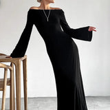 Elegante vestido largo ajustado de punto negro