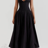 Elegante vestido midi negro sin tirantes